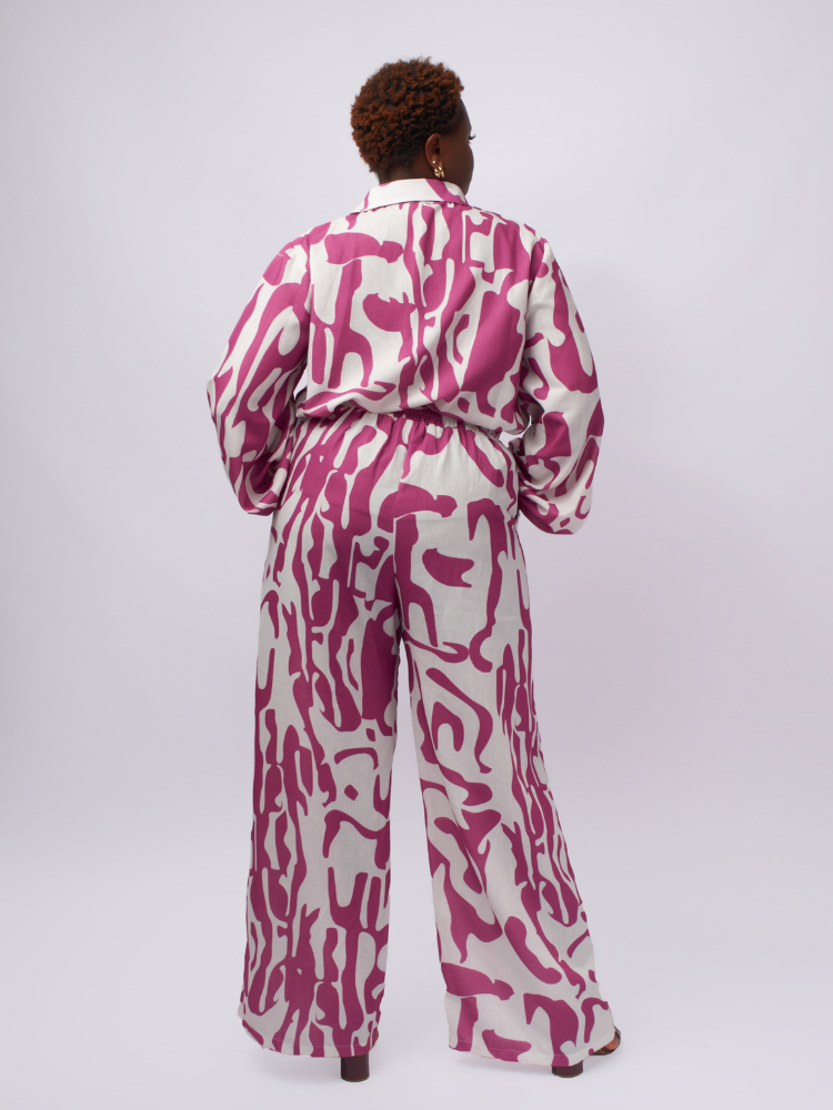 This purple print 2-piece pant set is a head-turning fashion statement.