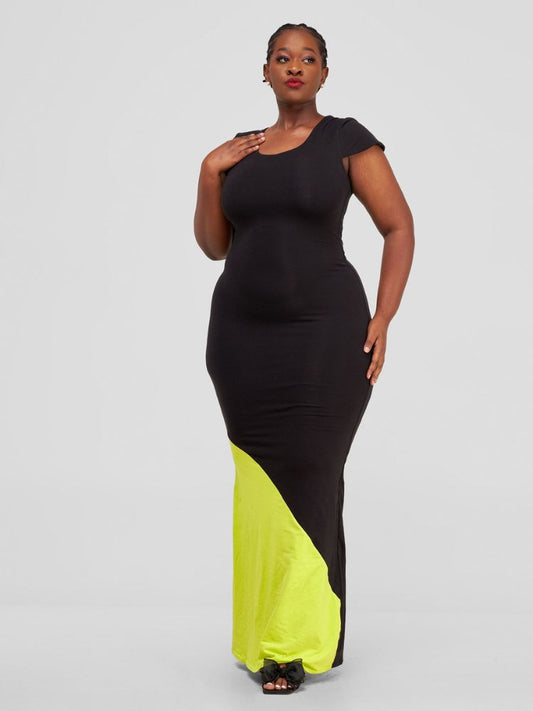 chic sleeveless maxi dress, featuring an elegant rounded neckline, double-layered construction, and a bold color-block panel at the bottom.