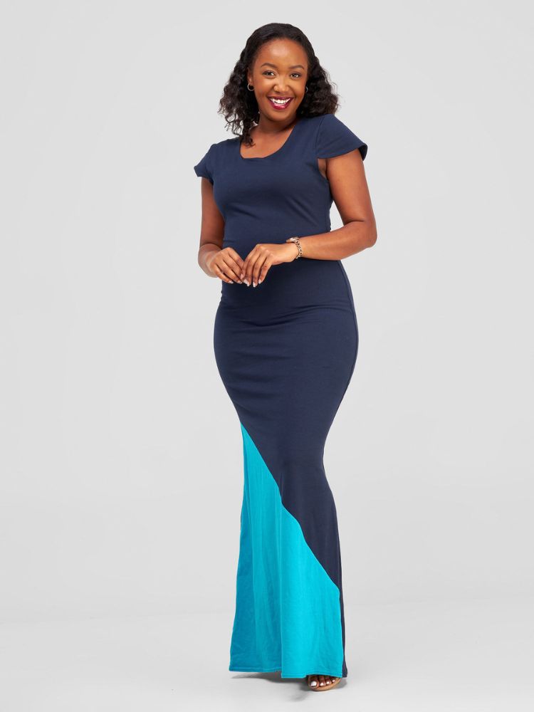chic sleeveless maxi dress, featuring an elegant rounded neckline, double-layered construction, and a bold color-block panel at the bottom.