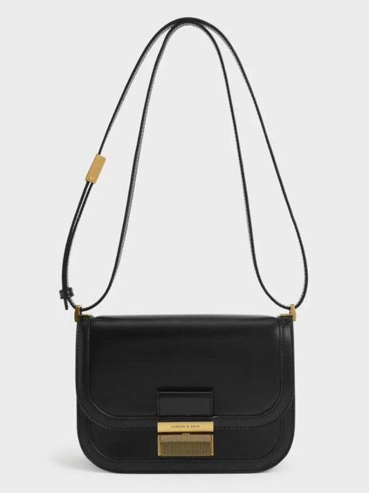 This bag features long, adjustable straps for versatile comfort and a gold lock for added glamour and security.
