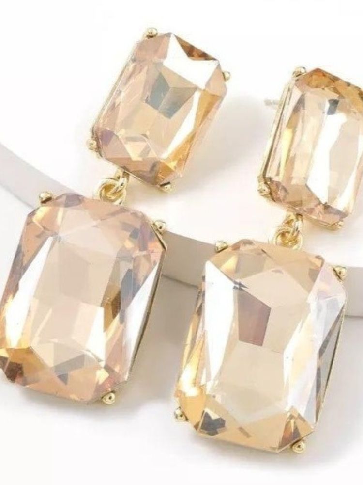  a 2 stone drop square pair of translucent gems. 