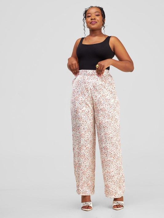 flowing palazzo pants with a discreet side zipper and a comfortably stretchy waistband at the rear. 