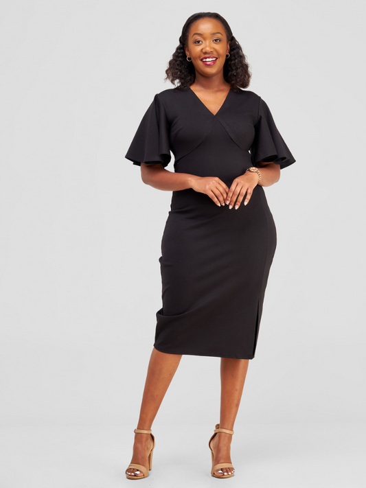  chic bodycon dress showcases flirty ruffled short sleeves and a daring side slit