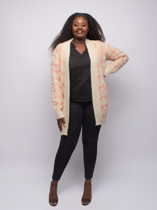 Cozy up in this fur-like diamond print cardigan with long sleeves and snug wrist stitching.