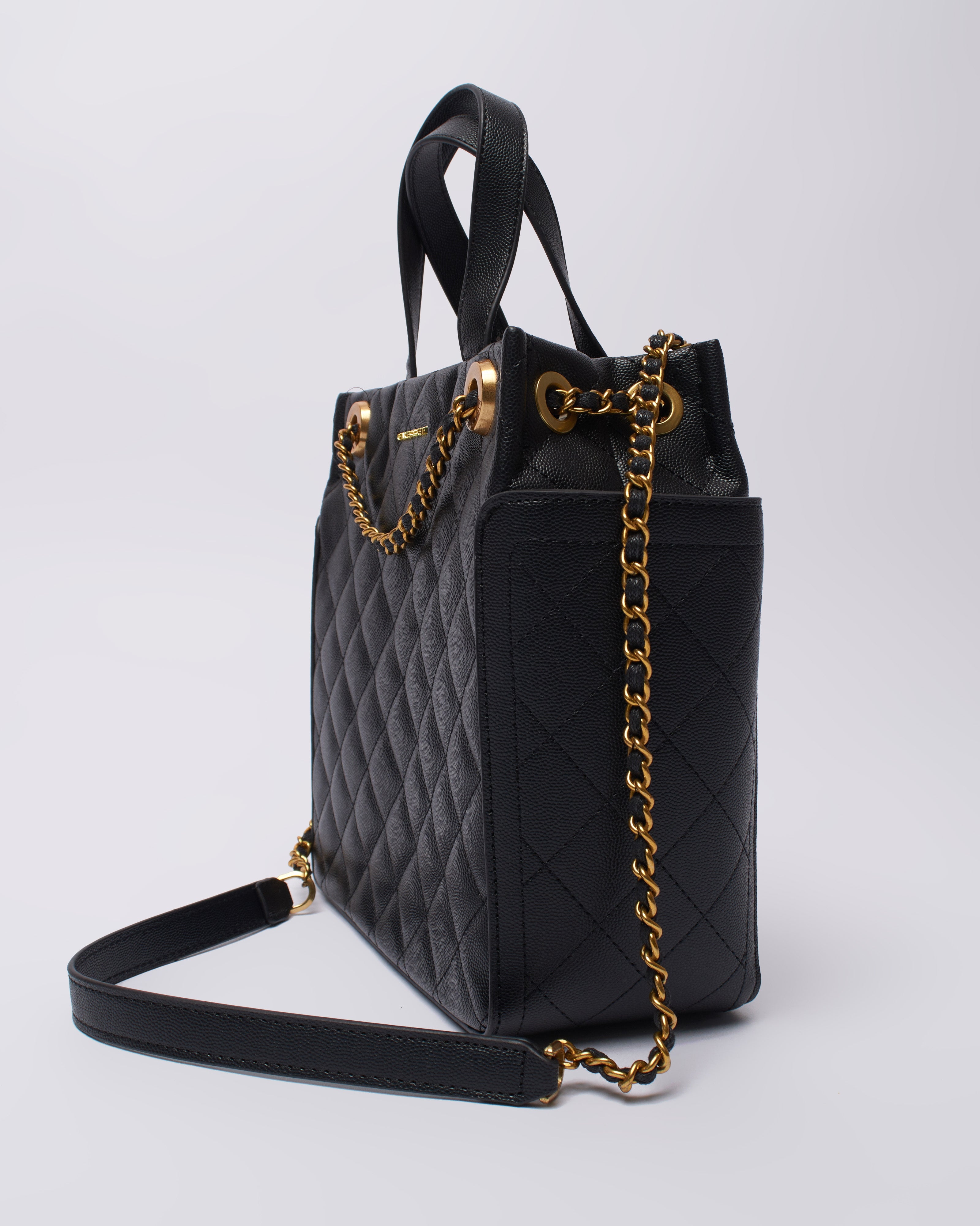 Charles and keith on sale quilted sling bag